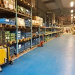 Shelves with boxes full of Ojop latch components