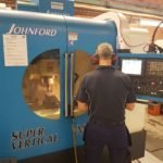 Toggle latch CNC machine operated by Ojop Sweden AB employee